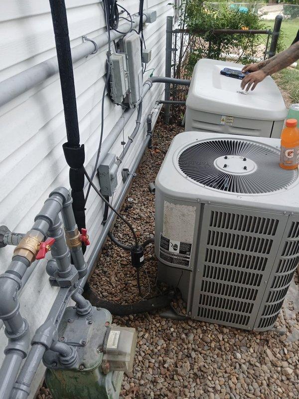 Installed 10 feet of gas piping with outside tap location to service HVAC equipment. Gas meter and shut-off valves with red handles were integrated into the installation, with proper connection to existing system. Permit was obtained through City of Streetsboro as required for compliance with local codes.
