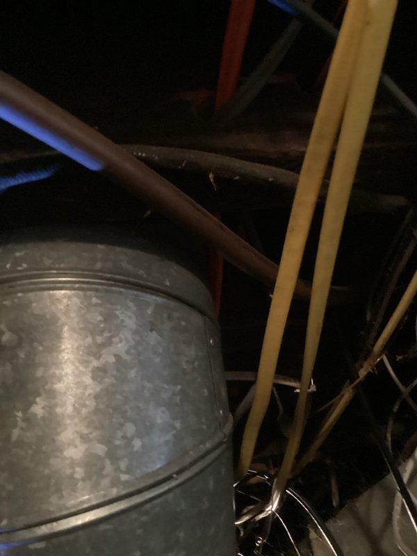 Conducted on-site assessment for complete piping system replacement in residential property with walls removed and floors excavated for access. Evaluated existing water supply lines, drainage piping, and waste lines throughout the structure requiring full replacement. Documented current infrastructure conditions including aged galvanized components, deteriorated piping in attic/ceiling spaces, and compromised mechanical connections. Assessed installation requirements for new stand-up shower fixture integration into updated plumbing system. Photographed existing conditions showing exposed framing, accessible pipe runs, and mechanical equipment locations to inform comprehensive replacement estimate.