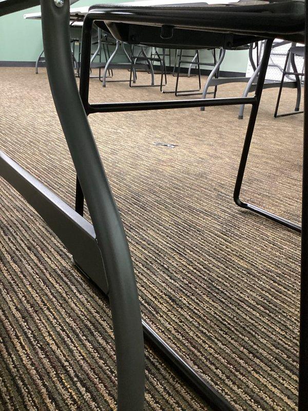 Responded to callback for recurring drain blockage in commercial facility affecting conference room and multiple toilets. Performed high-pressure jetting service to main sewer line to clear obstruction and restore functionality to plumbing system. Documented conditions of affected conference room area showing non-functional facilities requiring immediate attention.
