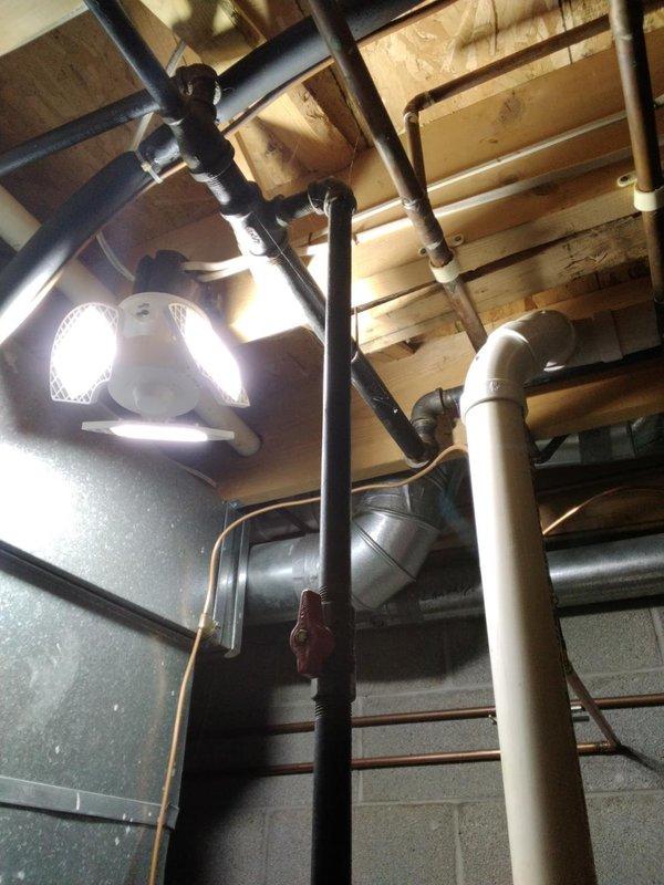 Installed approximately 25 feet of black iron gas piping in exterior and basement utility area. Routed new gas line through exposed ceiling joists, utilizing proper fittings including T-connections, elbows, and unions to ensure code-compliant installation. Installed red-handle gas shut-off valve for safety and system control. Coordinated piping route to avoid interference with existing plumbing, HVAC ductwork, copper lines, and PVC drain systems. All work performed in accordance with Summit County permit requirements and applicable gas piping codes.