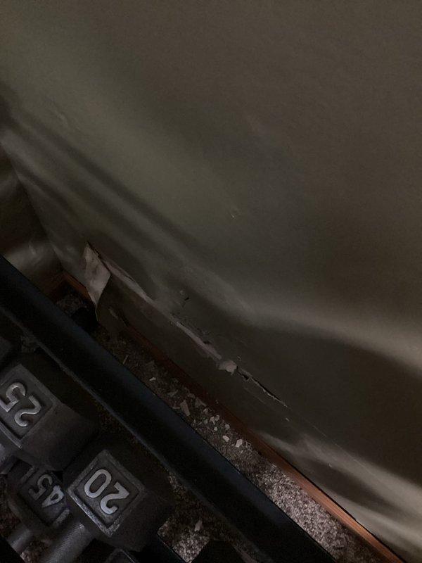 Responded to report of water damage near basement downspout drain. Performed video camera inspection of downspout drainage system to identify potential cracks or damage causing water infiltration. Documented findings with photographic evidence of exterior property conditions and relevant utility infrastructure for diagnostic purposes.