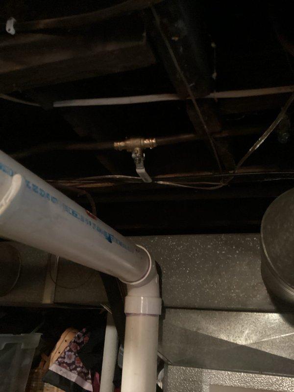 Completed comprehensive bathroom plumbing reconfiguration involving relocation of lavatory water supply lines and drain line 4 inches to the left. Removed outdated drum trap system and installed new PVC toilet flange for improved functionality and code compliance.

Installed complete new drainage system including dedicated shower drain line and separate lavatory drain line using approximately 20 feet of 1-1/2 inch PVC pipe. Ran new PEX water supply lines throughout bathroom for shower fixtures, utilizing 40 feet total of 1/2 inch PEX (20 feet hot, 20 feet cold).

Added two 2-1/2 inch ball valves to provide proper isolation capability for entire bathroom plumbing group. Installed three compression angle stops at fixture locations for individual shut-off control. All work performed to current plumbing codes with proper support and securing of all supply and waste lines within floor joist system.