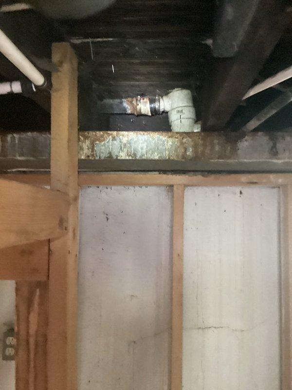 Responded to main sewer line clog causing multiple fixture backups, including two sinks. Performed main drain cleanout to clear blockage and restore proper drainage throughout the system. Documented existing infrastructure conditions in basement area, noting corroded cast iron piping and aging plumbing components that may require future attention.
