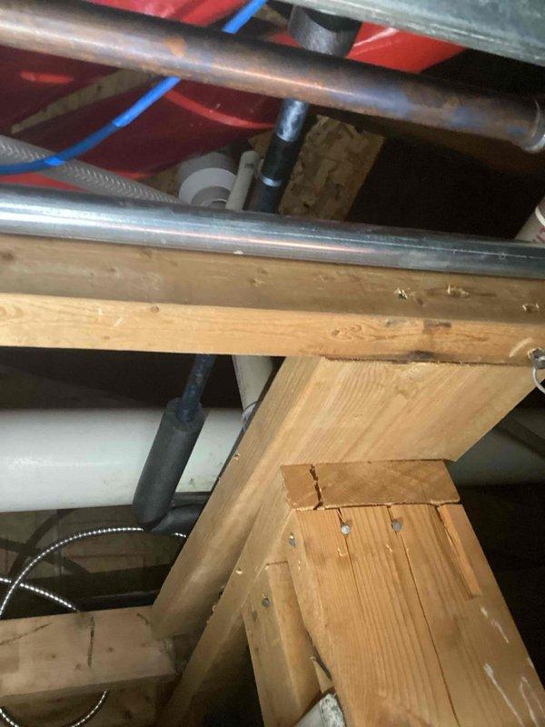 Responded to a commercial restaurant plumbing emergency involving a separated sewer stack that was causing sewer flies and foul odors throughout the establishment. Upon inspection in the crawl space, identified a failed connection in the drainage system where the stack had come apart, allowing sewer gases and pests to escape into the building. Installed new PVC piping to properly reconnect and secure the sewer stack, ensuring proper drainage flow and eliminating the source of odor infiltration and pest entry.