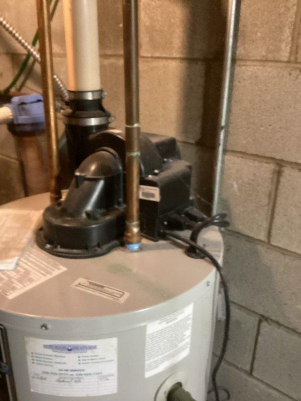 Responded to reported water heater leak at residential property. Upon arrival, conducted thorough inspection of tanked water heater unit and surrounding plumbing connections. Evaluated pump assembly, supply lines, and all pipe fittings for signs of active leakage or moisture accumulation. Examined existing installation including copper piping, PVC connections, and flexible conduits. Verified proper operation of circulation pump and associated electrical connections. Documented existing service history noting previous replacement work performed in December 2019. Assessed warranty status and overall condition of water heater tank and components. Provided evaluation findings and repair recommendations to address reported leak issue.
