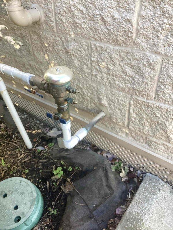 Performed annual backflow prevention assembly testing on two devices: a Watts reduced pressure assembly serving the domestic water supply, located indoors in the stock room, and a Febco assembly serving irrigation, located on the building exterior. Both assemblies were inspected, tested per applicable standards, and documented with photographs of the full device and serial plate. Completed test reports with brand, model, serial number, size, location, and service protected were prepared for submission to the water purveyor.