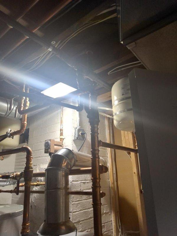 Installed approximately 40 feet of 1.25" gas piping from the interior tap location at the existing meter, routed along the overhead joists and connected to the appliance supply in accordance with local code. Work was performed under the required permit, with all connections secured and ready for pressure testing and inspection.