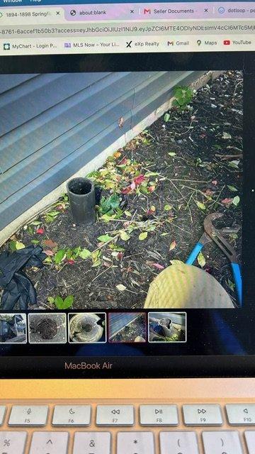 Performed a visual assessment of the exterior drain pipe openings identified during the home inspection, which were found packed with mud, sediment, and debris. No cleaning or other work was performed, per the request. The pipes were evaluated to determine their function (likely sewer cleanouts or drain risers), and an estimate for cleaning them out was prepared along with a recommendation for a sewer scope of the main lateral.