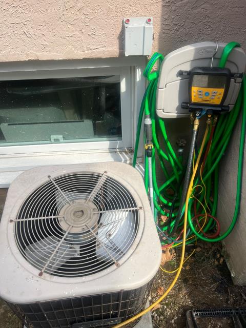 Ac repair service call. Ac System needs freon. Recharge air conditioner with freon. Performed dual start replacement and fan blades adjustment.