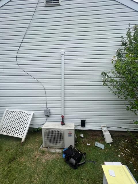 AC service call. Performed ac repair on Mitsubishi system. Recharge system with freon.
