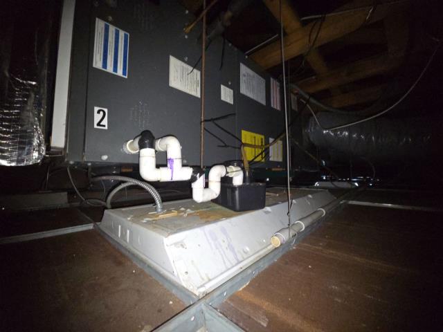 Emergency HVAC service call in Chalfont, PA 18914. The classroom's system above the drop ceiling was leaking due to missing drip pan protection, causing water damage to ceiling tiles. Our team performed a full diagnostic and provided repair to prevent future leaks and keep the students comfortable and safe.