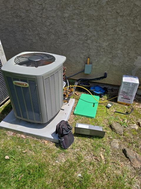 Responded to AC service call in New Hope, PA 18938. The Lennox unit fan was operating but blowing warm air. Recharged refrigerant and carried out annual Comfort Club maintenance to prepare for summer.
