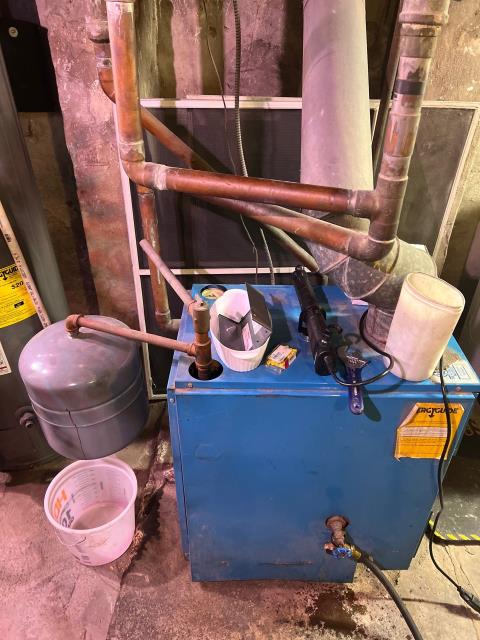 Visited a home in philadelphia, pa 19147 to inspect a boiler that wasn’t lighting properly after the homeowner attempted to replace the thermocouple. Found multiple issues, including a bad aquastat relay, a leaking expansion tank, and a minor gas leak at the pilot light connection. Drained the boiler, replaced the expansion tank and aquastat relay, repaired the gas leak, and bled the radiators. System tested and operating safely—backed by a 1-year part and labor warranty for peace of mind.