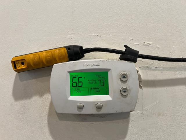 Responded to a heating comfort concern in philadelphia, pa 19125. The tenant reported that despite setting the thermostat to 73°f, indoor temperatures stayed around 64°f, while the upstairs neighbor’s unit stayed overly warm. Found a dirty filter restricting airflow and noted that both supply and return vents were located high in the 12-foot ceiling, causing poor air circulation. Took temperature readings; supply air measured at 120°f and confirmed system operation.
