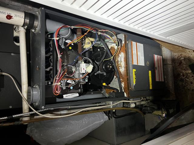 Wrapped up a heating concern from a customer in philadelphia, pa 19104, reporting no warm air in one of the rooms despite the system running. After inspection, we replaced the air filter and discovered a leak at the collector box or motor, which had caused rust on the heater unit. Further repair is recommended to prevent future system damage and ensure even heating throughout the space.