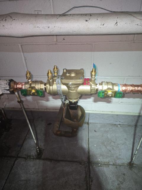 Completed the replacement of a 1” RPZ backflow preventer for a customer in Philadelphia, PA 19124. The existing RPZ assembly had failed, so we removed and properly disposed of it before installing a new Watts Series LF009 1” Reduced Pressure Zone (RPZ) assembly on the horizontal supply line. We also installed the required shut-off valves on both the inlet and outlet sides and ensured all pipe fittings and hardware were securely installed for a clean, code-compliant setup. After installation, we performed backflow certification testing and submitted the test report to the local water authority to confirm compliance. The system is now fully functional, protecting the potable water supply, and the customer is backed by a 1-year workmanship warranty along with the manufacturer’s standard coverage.