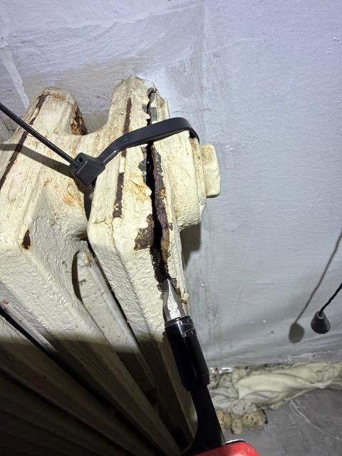 Performed a diagnostic inspection at a rental property in Philadelphia, PA 19124, for a cast iron boiler heating system that was not working. Upon inspection, the boiler exhibited multiple mechanical and safety concerns, including active leaks, a rusted gas valve, and abnormal noises from the fan center and relay, indicating internal component wear. The bathroom radiator was also found to be cracked, with piping inaccessible from the basement. Due to the severity of the issues, repairs are not recommended, and replacement of both the boiler and the radiator is advised. A detailed replacement proposal is prepared for the customer, ensuring safe and efficient heating for the property.