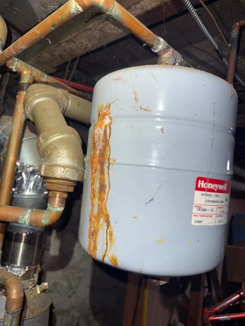 Performed a diagnostic inspection at a rental property in Philadelphia, PA 19124, for a cast iron boiler heating system that was not working. Upon inspection, the boiler exhibited multiple mechanical and safety concerns, including active leaks, a rusted gas valve, and abnormal noises from the fan center and relay, indicating internal component wear. The bathroom radiator was also found to be cracked, with piping inaccessible from the basement. Due to the severity of the issues, repairs are not recommended, and replacement of both the boiler and the radiator is advised. A detailed replacement proposal is prepared for the customer, ensuring safe and efficient heating for the property.