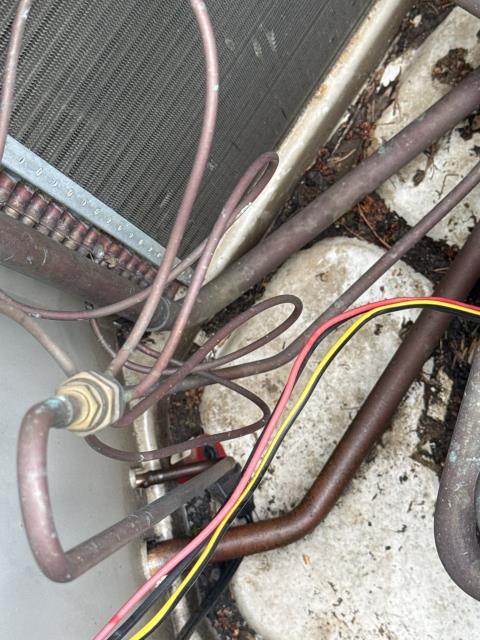 Addressed a cooling system issue with no air from vents. Diagnosed a low-voltage short, replaced the transformer, and installed a new reversing valve coil. The system now operates correctly in cooling mode.