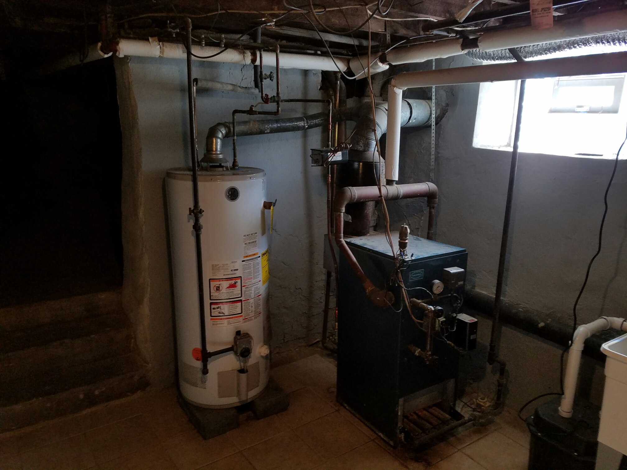 Free estimate for residential HVAC project in Wynnewood, PA: to remove old steam boiler and radiators, design and install ductwork for central air system, install new high efficiency Lennox forced air gas furnace with air conditioning unit, with condenser located on the side of the house. 