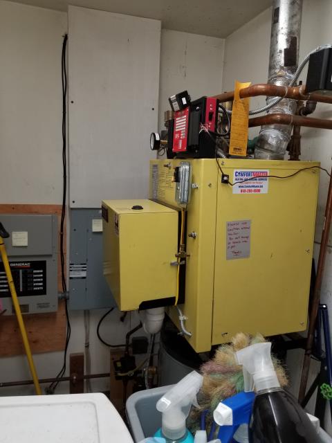 Installed antifreeze in System 2000 oil boiler to protect against frozen pipes in crawl space. Also performed tuneup and tested operation. Found wide pressure swings during burner operation due to defective expansion tank. Replace tank, and installed webstone isolation valve to allow for future testing without draining heating system.