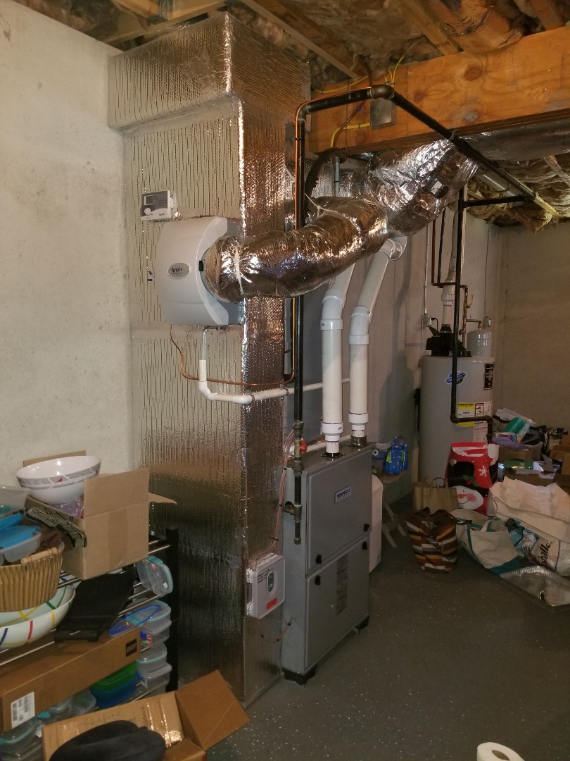 Tempstar Gas Furnace and central air system, with bedroom zone not cooling. Manually opened defective zone damper to allow cooling until new control is installed.