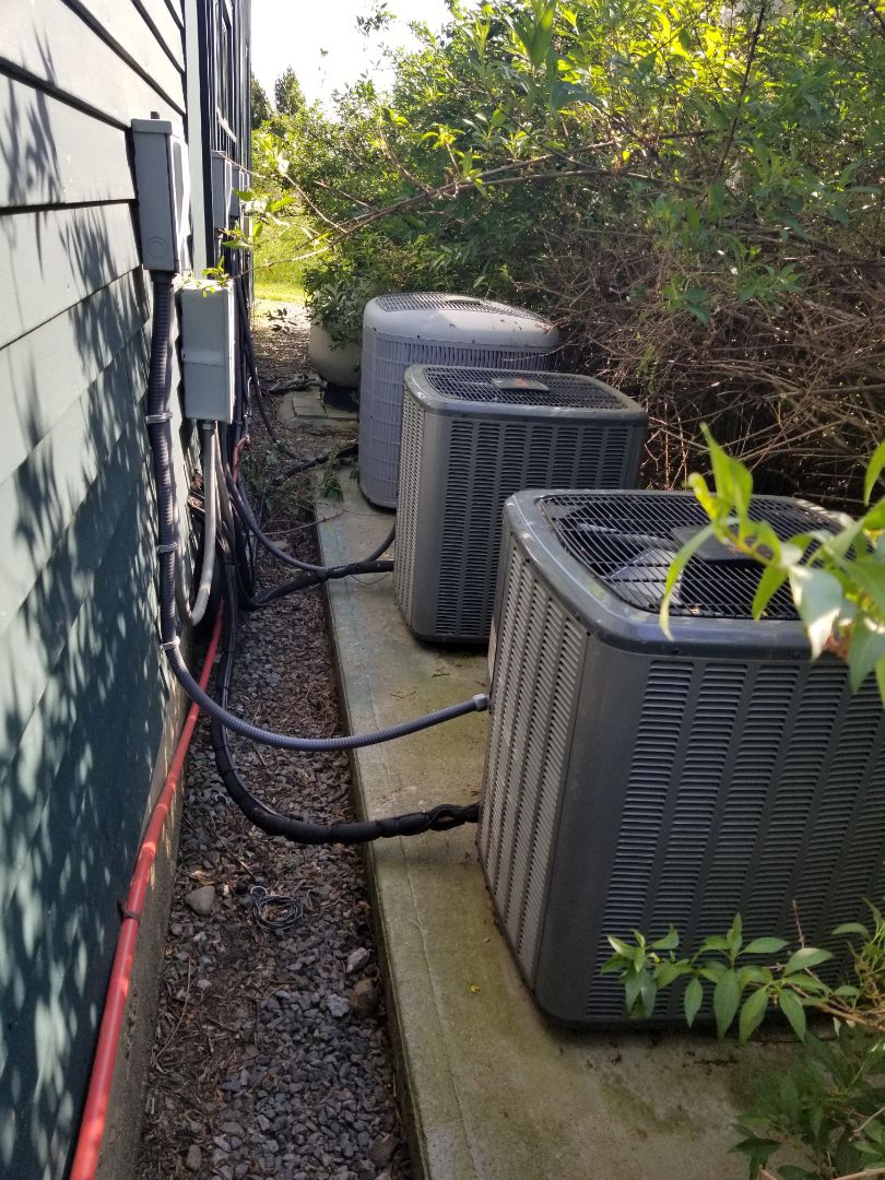 Amana Condenser with Unico Air Handler not cooling. Found wiring pulled off power logs in disconnect, also low on freon. Odor coming from unit caused by growth on indoor unit coil. Performed deep cleaning.