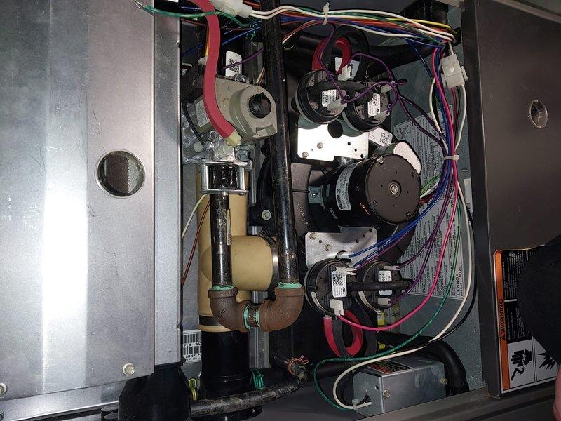 Performed scheduled maintenance on furnace unit under Worry Free Service Agreement. Inspected internal components including blower assembly, motors, electrical connections, and condensate drain system. All components appear to be in normal working condition with properly secured wiring and no visible signs of damage or deterioration.