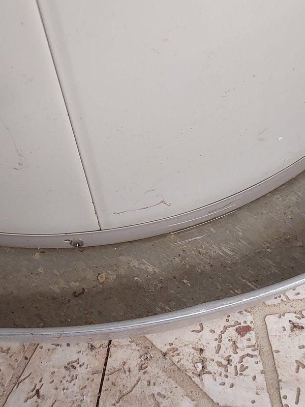 Performed Worry Free Service Agreement maintenance on customer's heating system. Noted deterioration and damage at the base of the metal vent pipe, including a concerning hole/opening where the flue connects to the unit. Documented condition with photos showing potential water damage and deteriorated insulation around connection points.