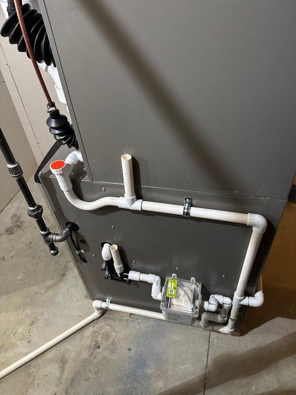 Successfully installed a new Lennox complete HVAC system, including furnace, air conditioner, S40 thermostat, and humidifier. System installation included proper PVC ventilation/drainage components with appropriate connections and a condensate pump. All equipment was professionally mounted with proper copper line connections and flexible ductwork in the utility area.