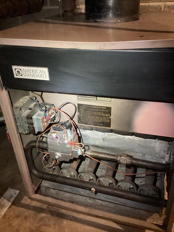 Performed routine maintenance on American Standard boiler system. Inspected internal components including burner assembly, gas valve, and copper piping connections for proper operation. Checked expansion tank and ductwork integrity, ensuring all connections were secure and system was functioning according to manufacturer specifications.