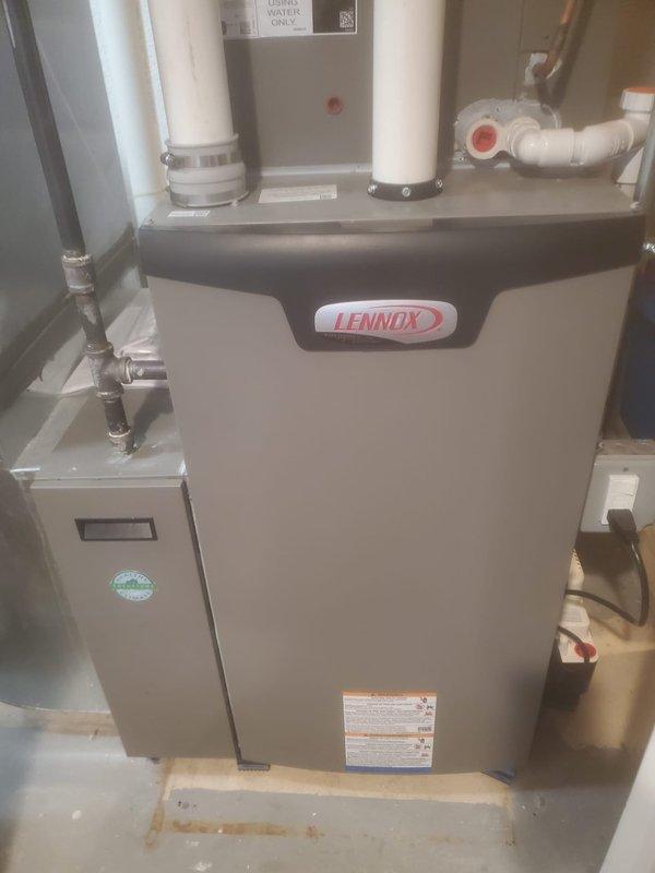 Performed scheduled maintenance on Lennox heating system under Worry Free Service Agreement. Inspected all internal components including blower motor assembly, circuit board connections, and wiring harnesses, finding system in normal working condition. Examined ventilation system including PVC piping and verified proper installation and functioning of all components.