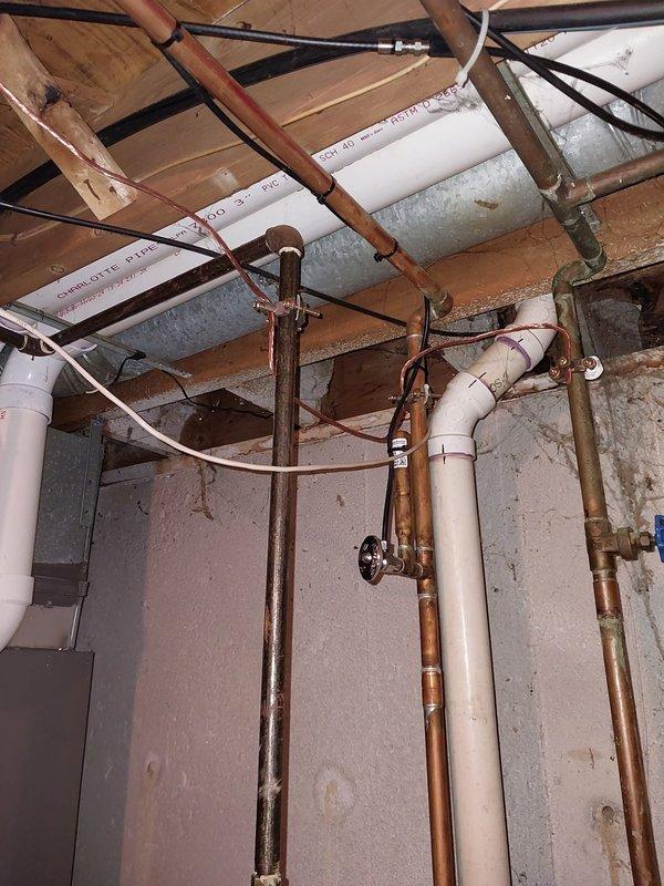 Inspected thermostat communication with furnace after recent maintenance. Verified proper wiring connections at the circuit board, ensuring all control wires (white, blue, brown, green, yellow, and pink) were properly secured with wire nuts. Confirmed system functionality with successful communication between thermostat and furnace.