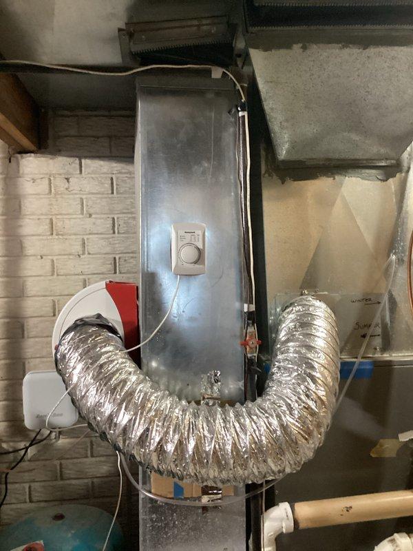 Inspected 20-year-old non-operational furnace system located in basement. Evaluation revealed outdated equipment with significant wear on metal casing, ductwork connections, and electrical components. Recommended full replacement of existing natural gas furnace and associated ductwork to restore heating functionality.