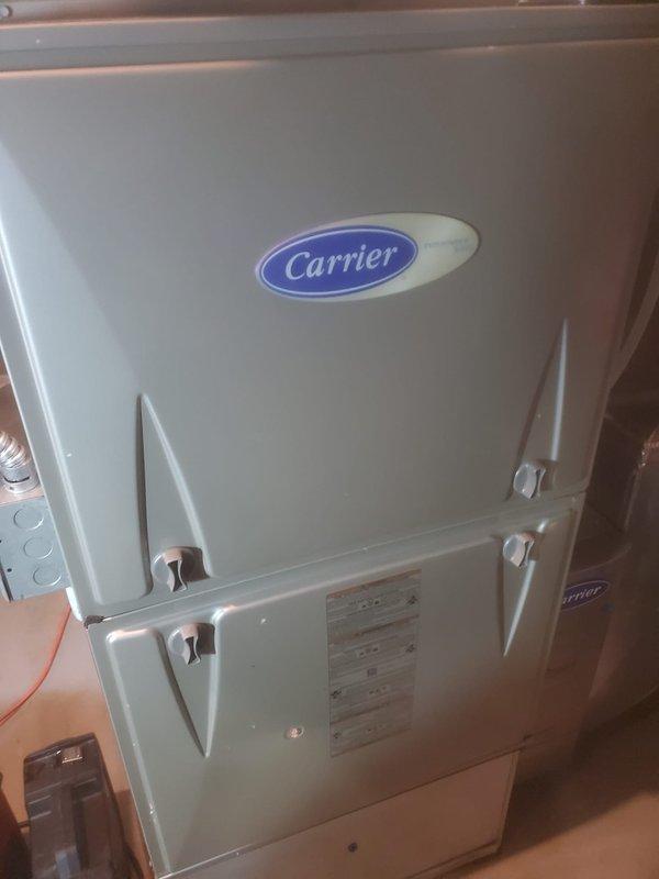 Performed scheduled routine maintenance on 8-year-old Carrier furnace. Inspected interior components including blower motor, control board, wiring connections, and heat exchanger - all in normal working condition with minimal dust accumulation. System is functioning properly with no operational issues identified. Maintenance contract extends through 2025.