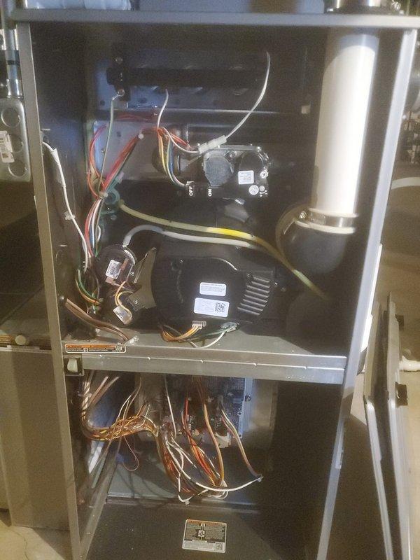 Performed scheduled maintenance on two Bryant HVAC systems. Inspected interior components of furnace units including motor assembly, electrical connections, and ventilation systems. All systems were found to be properly assembled and functioning normally with no issues identified.