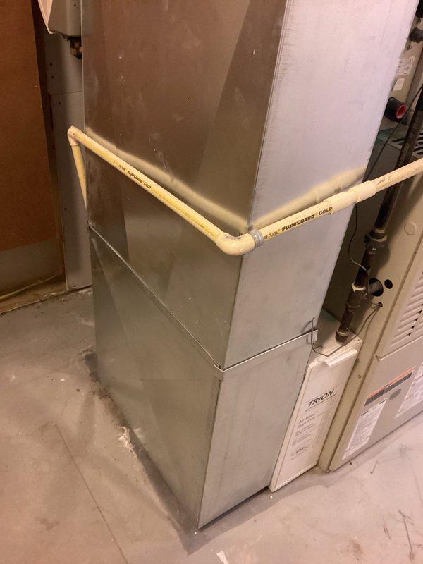 Performed diagnostic assessment of heating system and confirmed presence of cracked heat exchanger. Recommended complete replacement of affected unit. Customer also requested addition of humidifier system to be bundled with the replacement service. Installation scheduled for afternoon timeframe per customer availability requirements.