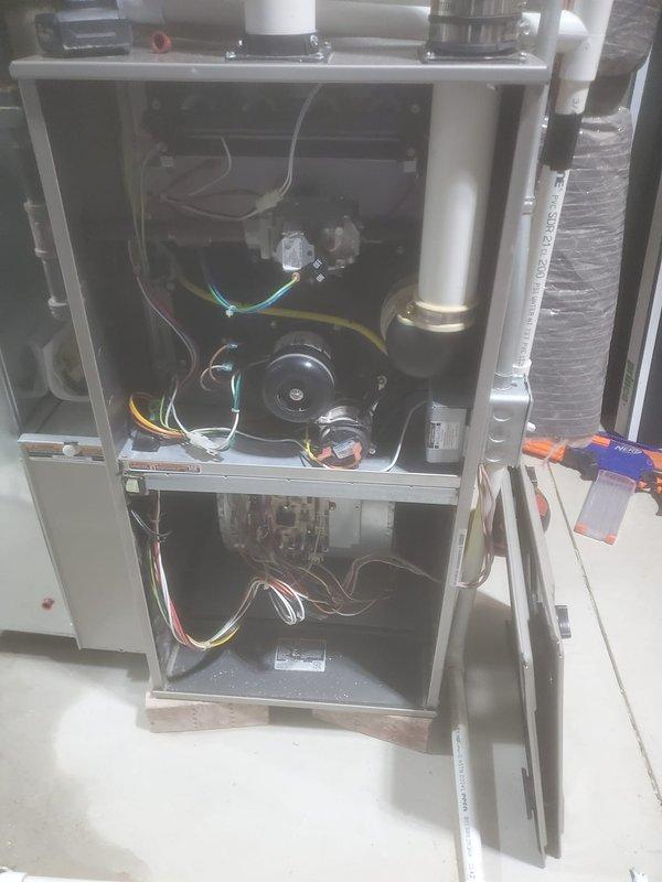 Performed annual heating maintenance on two 6-year-old Bryant basement furnace units under Worry Free Service Agreement. Inspected internal components including blower assembly, heat exchanger, electrical connections, and PVC venting system. Both units functioning properly; humidifiers were checked and serviced as part of the comprehensive tune-up.