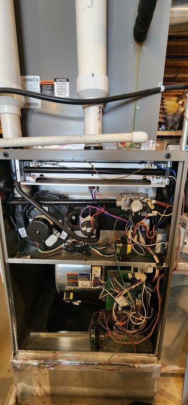 Performed scheduled furnace maintenance on Lennox heating system. Inspected internal components including circuit boards, wiring harnesses, and blower motor assembly. Verified proper operation of ventilation system and examined all connections including gas line and electrical components.
