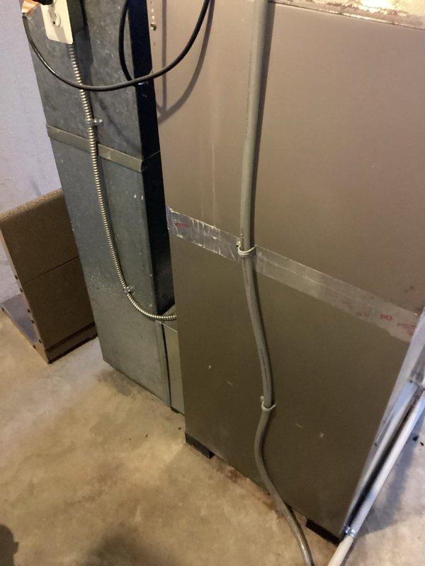 Completed evaluation of existing HVAC system for full system replacement quote (CQ Quote: 03689-04 and 03689-02). Inspected current furnace installation, associated ductwork, electrical connections, condensate lines, and ventilation components in basement utility area. System replacement estimate prepared based on observed configuration and space requirements.