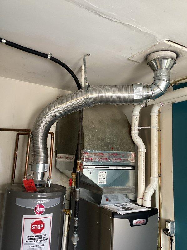 Successfully installed a Lennox downflow furnace in the residential mechanical room, with proper connection to existing ductwork system including metal tape at seams for proper sealing. Installed PVC venting system according to specifications, with all connections secured and system tested for proper operation.