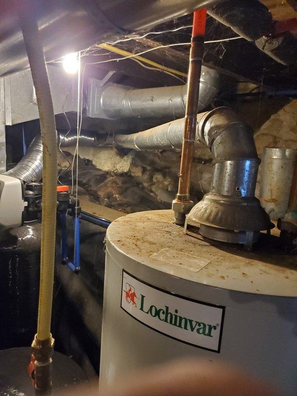 Successfully installed a 40-gallon short Lochinvar water heater system in the basement utility area, including proper connection of copper piping with appropriate valving. All connections were tested for leaks and the unit was verified to be functioning correctly.