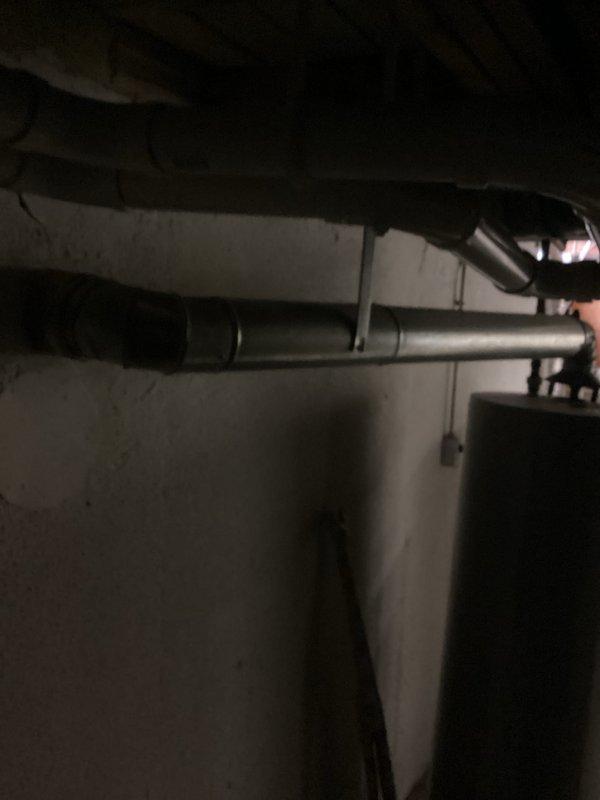 Conducted inspection of existing Whirlpool water heater unit for potential replacement. Evaluated current plumbing connections including copper supply lines, drain configuration, and shutoff valve functionality. Provided customer with replacement options and installation estimate for new water heater system.