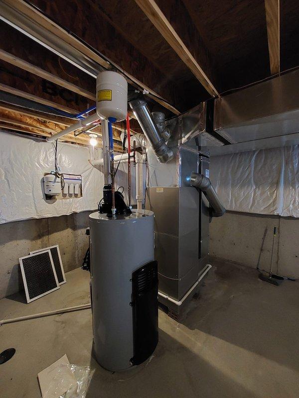 Responded to customer complaint of furnace humming noise during startup. Performed diagnostic inspection of furnace unit, examining motor assembly and electrical components. Identified normal operational sounds; system functioning within manufacturer specifications. No repair action required as unit is operating correctly.