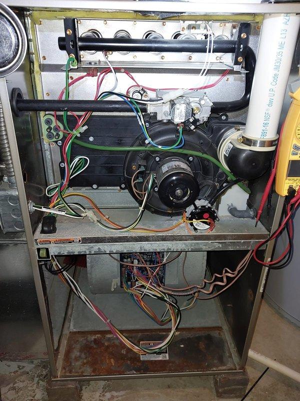 Responded to customer complaint of furnace humming noise during startup. Performed diagnostic inspection of furnace unit, examining motor assembly and electrical components. Identified normal operational sounds; system functioning within manufacturer specifications. No repair action required as unit is operating correctly.
