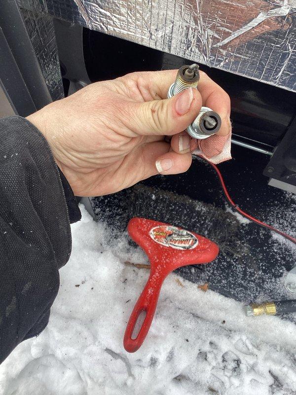 Performed scheduled maintenance on customer's generator. Inspected internal components and replaced worn spark plugs to restore optimal ignition efficiency. System was tested and verified to be functioning properly after service.