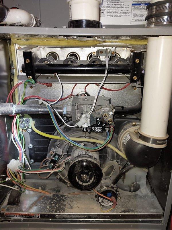 Diagnosed furnace with intermittent protection mode fault. Inspected control board and found faulty DIP switch settings causing system lockout. Reset control board parameters and cycled system through multiple test runs to verify stable operation. Furnace now operating normally without entering protection mode.