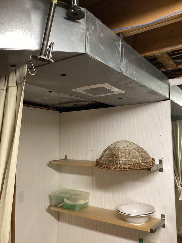 Performed comprehensive assessment of existing HVAC system, including inspection of suspended ceiling-mounted air distribution components and evaluation of metal ductwork in basement/utility area. Documented current installation configuration to prepare accurate replacement estimate for full system or single component options, with particular attention to existing duct layout and venting requirements.