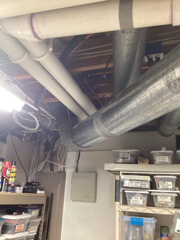 Conducted comprehensive replacement assessment of existing HVAC system in basement utility area. Evaluation included examination of furnace unit, ventilation components, and current ductwork configuration (noted "no flex before"). Documentation completed for quote #03711-01 FRN REPL EST (1 of 2)1-3, with photographic evidence of installation area showing existing PVC venting, galvanized ductwork, and available utility space.