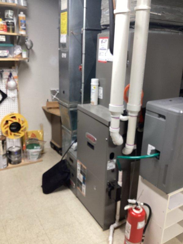 Conducted comprehensive replacement assessment of existing HVAC system in basement utility area. Evaluation included examination of furnace unit, ventilation components, and current ductwork configuration (noted "no flex before"). Documentation completed for quote #03711-01 FRN REPL EST (1 of 2)1-3, with photographic evidence of installation area showing existing PVC venting, galvanized ductwork, and available utility space.